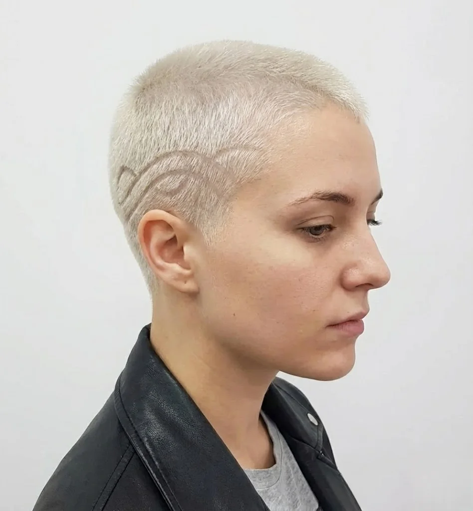 Fading buzz cut with wave design for women