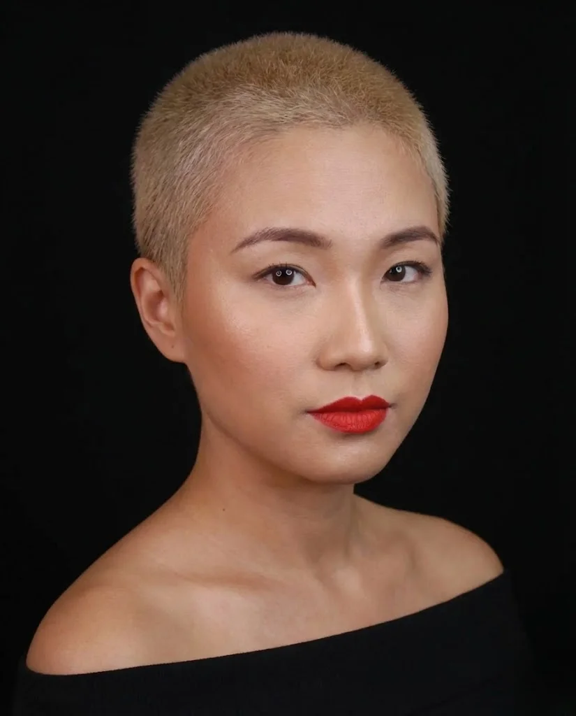 Golden blonde buzz cut style for women