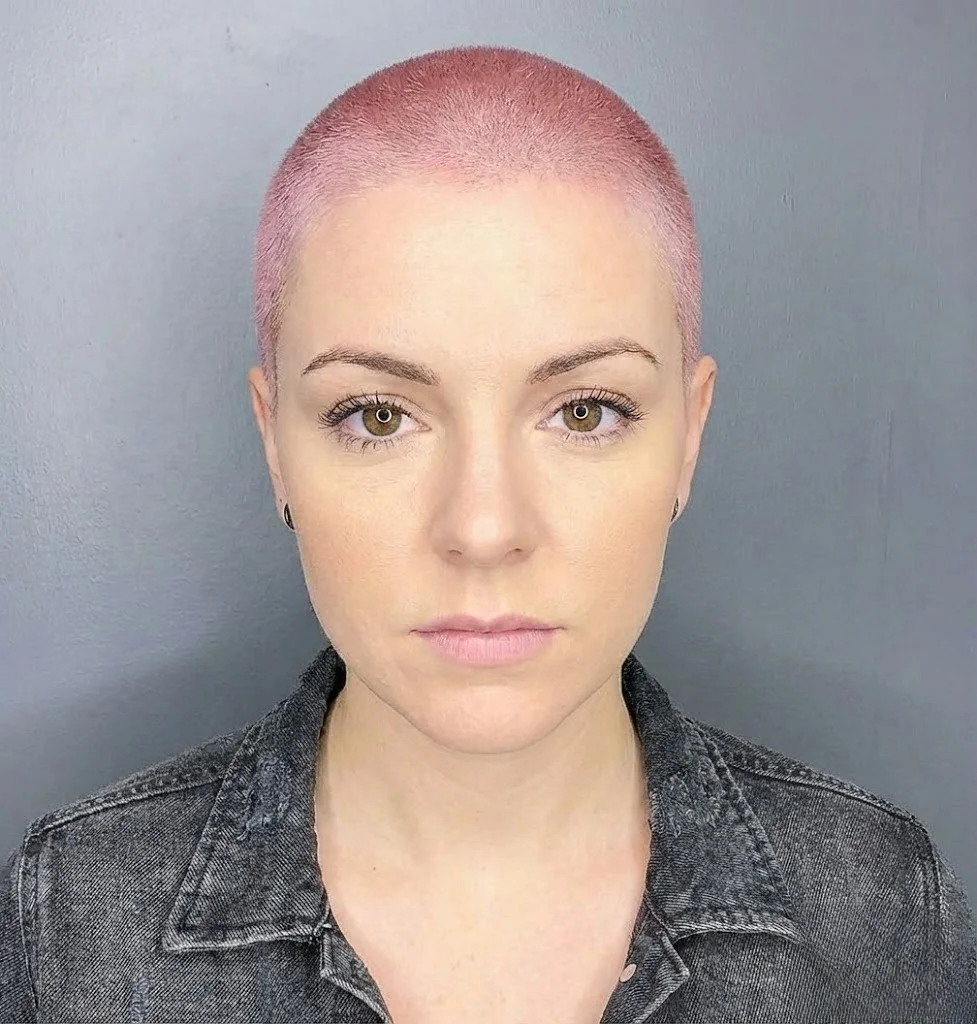 Pastel pink buzz cut style for women